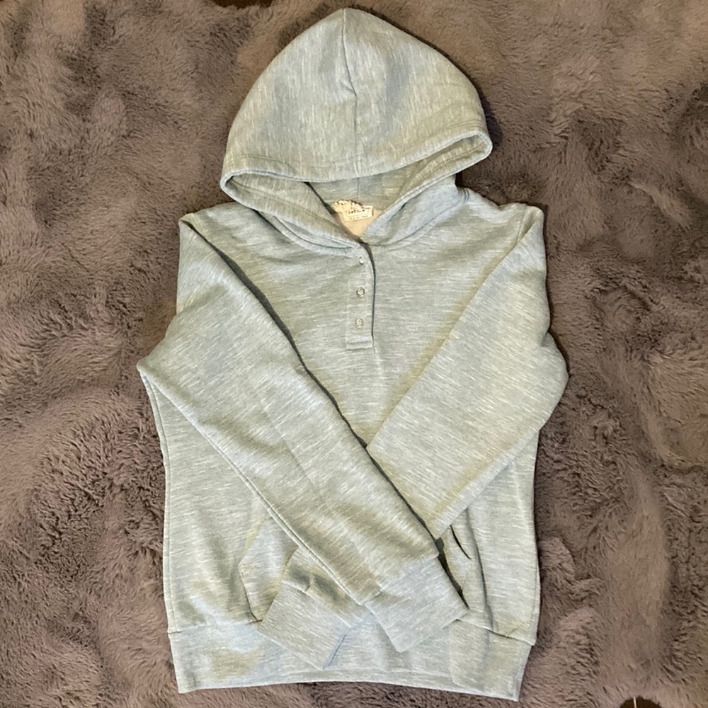 Teal colored hoodie with buttons